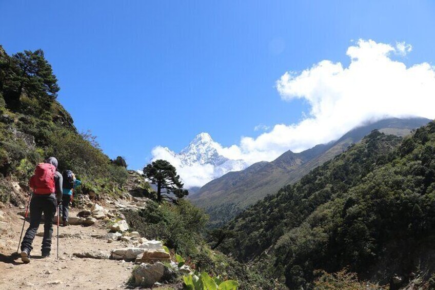 Trekkers with Mt. Amadablam on Background