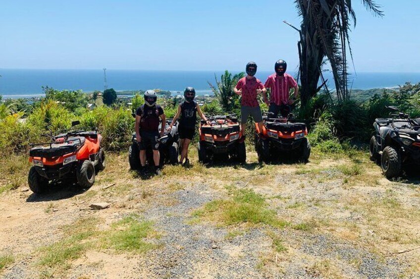 Guided ATV Tour on Mountain Dirt Road with Views of Roatan