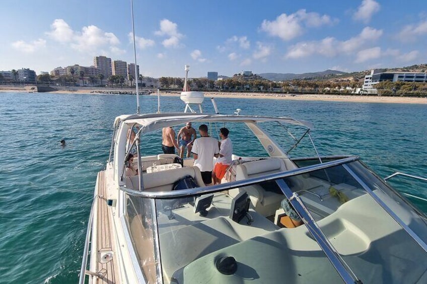 Private Tour with Lunch in Sitges on a Modern Motor Boat and Back