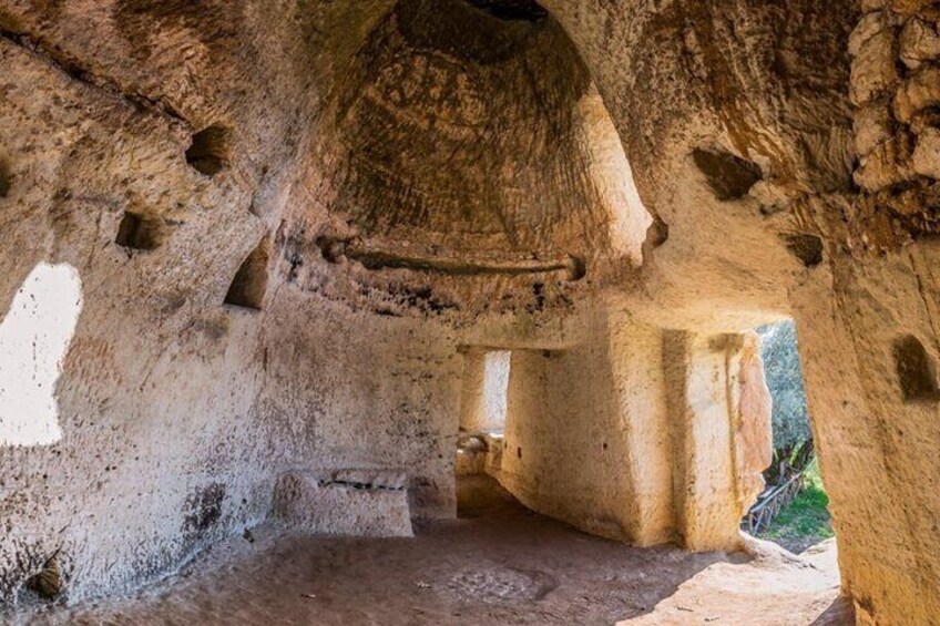 Tour of an ancient rock settlement and its caves from Tropea