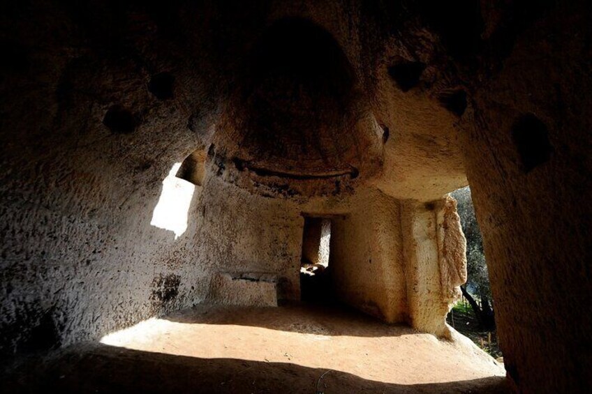 Tour of an ancient rock settlement and its caves from Tropea