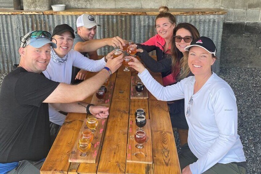 Friends cheers outside Bleeding Heart Brewery in Palmer.