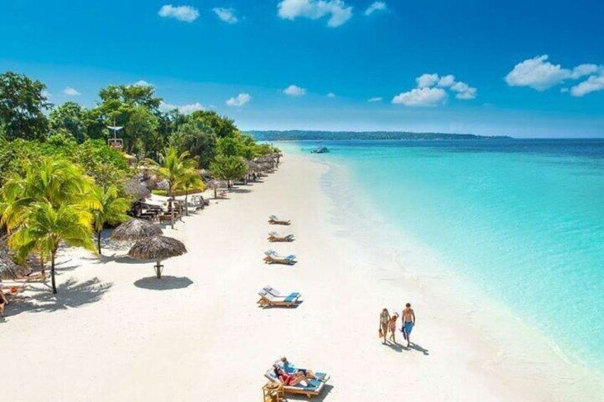 Take a stroll on Negril's Seven Mile Beach