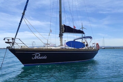 Sailing snorkeling in the coast of Syracuse