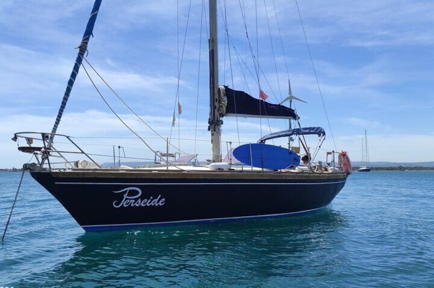 Sailing snorkeling in the coast of Syracuse