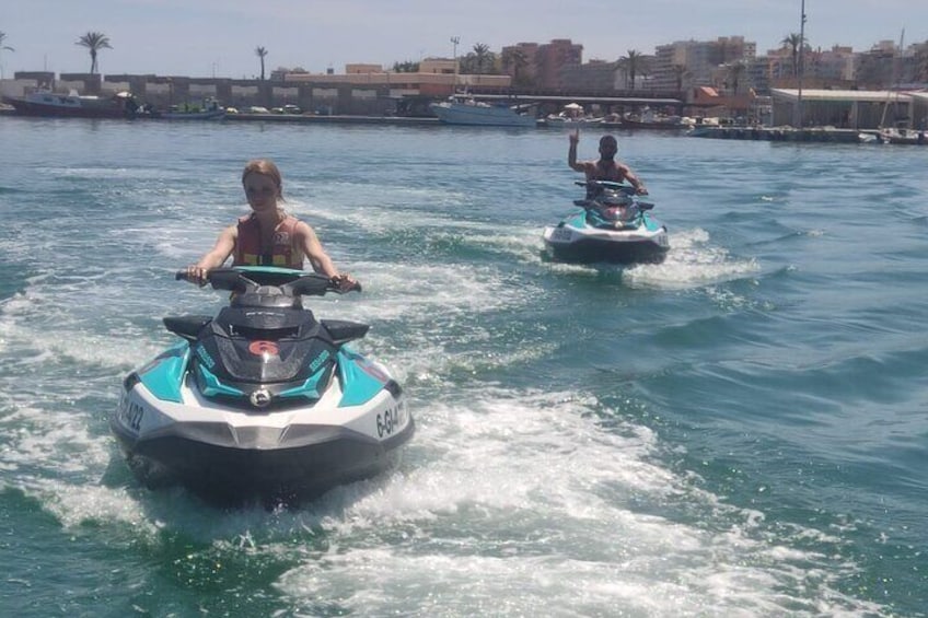 Couple on two jet skis