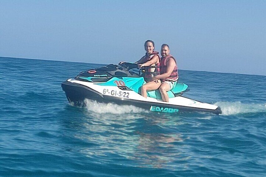 Couple enjoying a jet ski