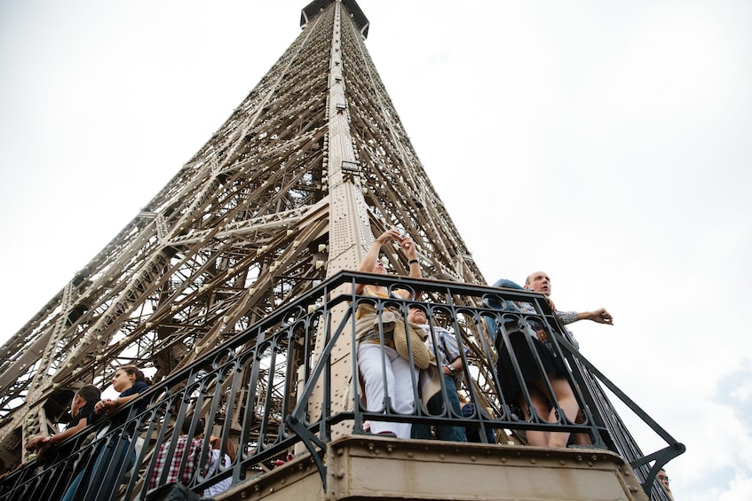 Tourists on the 2nd level of the Eiffel Tower in Paris