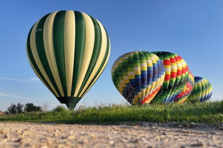 Hot air balloon over the hills of Pienza, Montalcino and Val D'Orcia