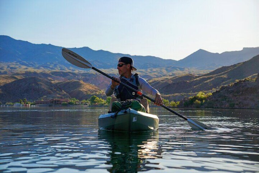 A kayaker explores the river.