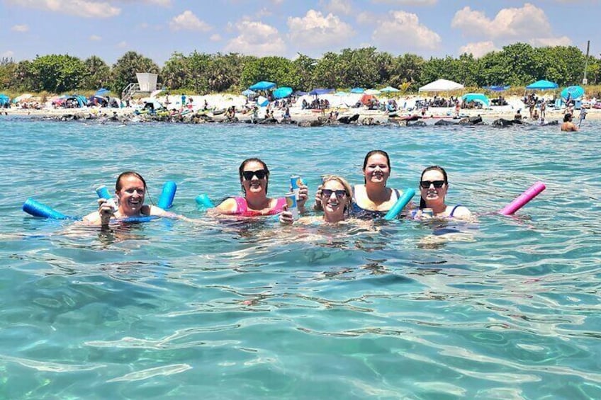 Customize your trip and stop off at the sandbar for a swim at Peanut Island! 