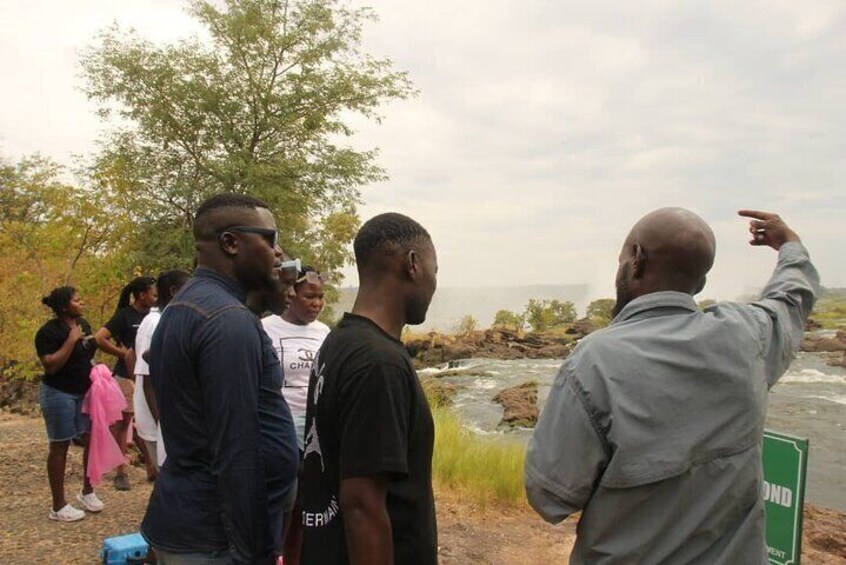 Combo Tour,white rhinos interaction and Guided tour of The Falls 