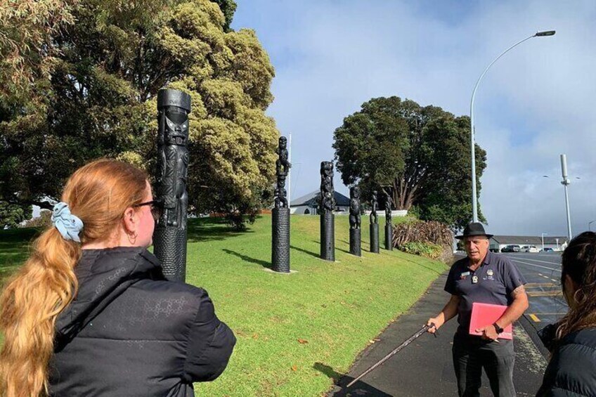 Carved poles representing our significant historical event, Tauranga