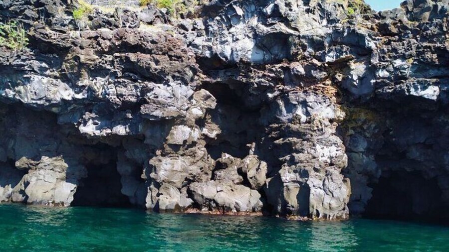 Aci Trezza:boat tour Cyclop coast,culture,swim in the caves,food