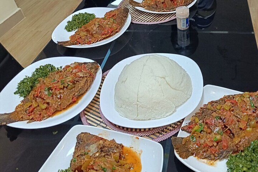 Samaki (Tilapia) from the lake region served with ugali and greens