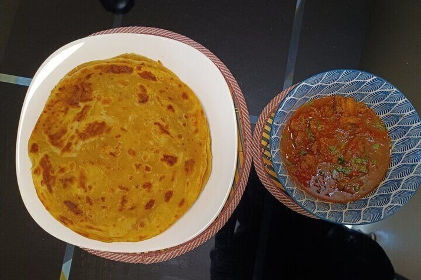 Chapati served with mbuzi stew (goat)