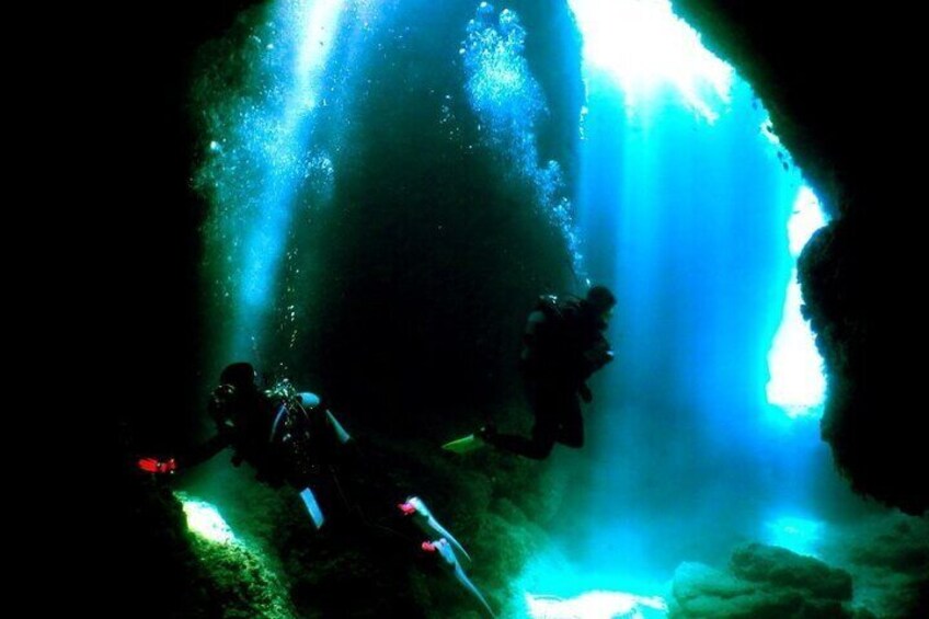 There are over 50 diving spots, including the Cave of Light.