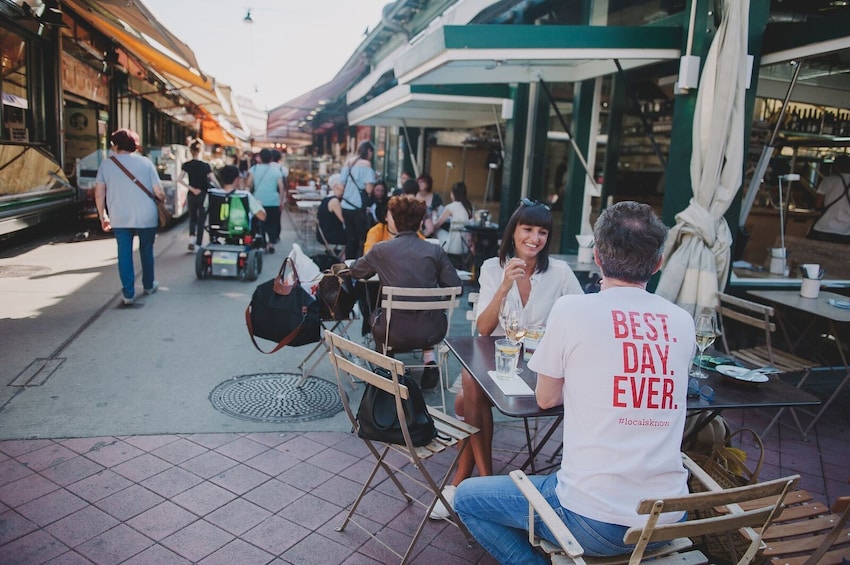 People eating at outdoor restaurant in Vienna