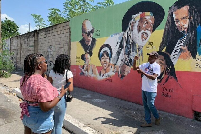 Our Tour Guide Christopher Creary highlighting some interesting Reggae Music facts.