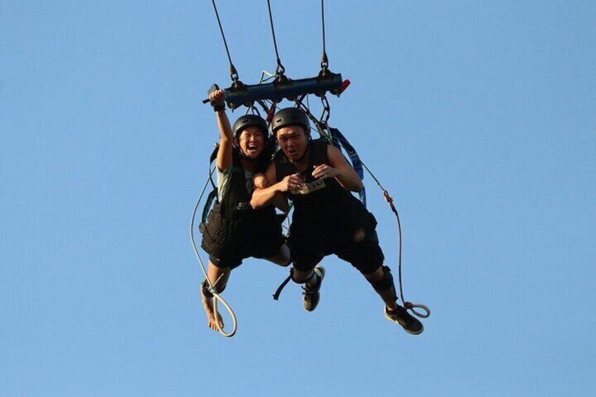 Fly through the air above the beautiful Sentosa beach at up to 120km/h by yourself or in a group of 3