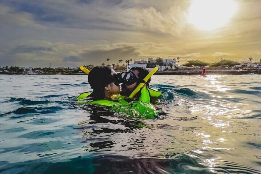 Couple Snorkeling Aruba Sunrise 