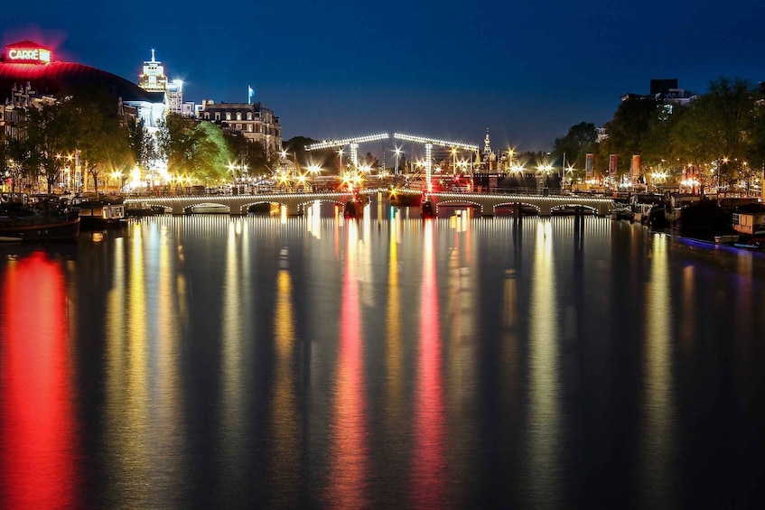 Picture 1 for Activity Amsterdam: Light Sculptures Small Boat Tour with Gluhwein