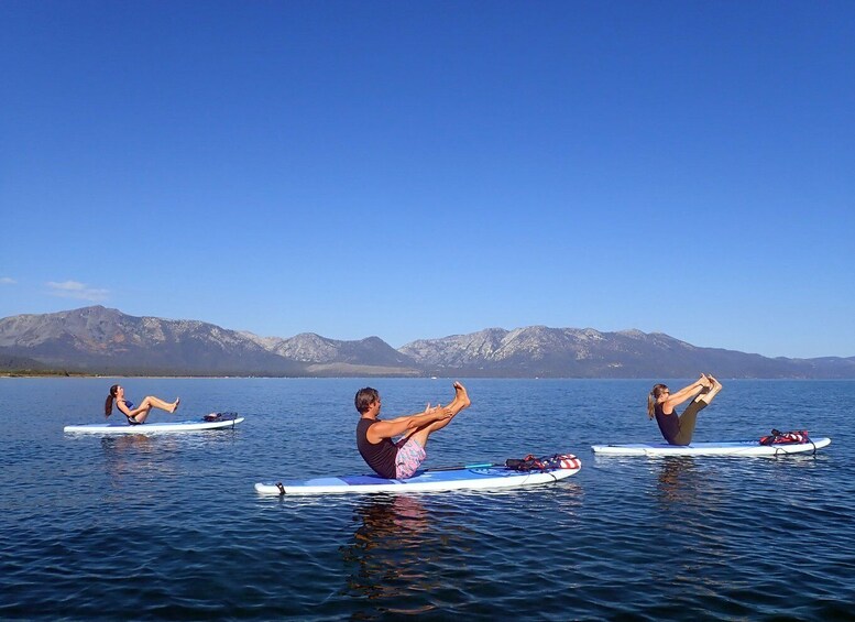 Picture 1 for Activity Lake Tahoe: Stand Up Paddle Yoga