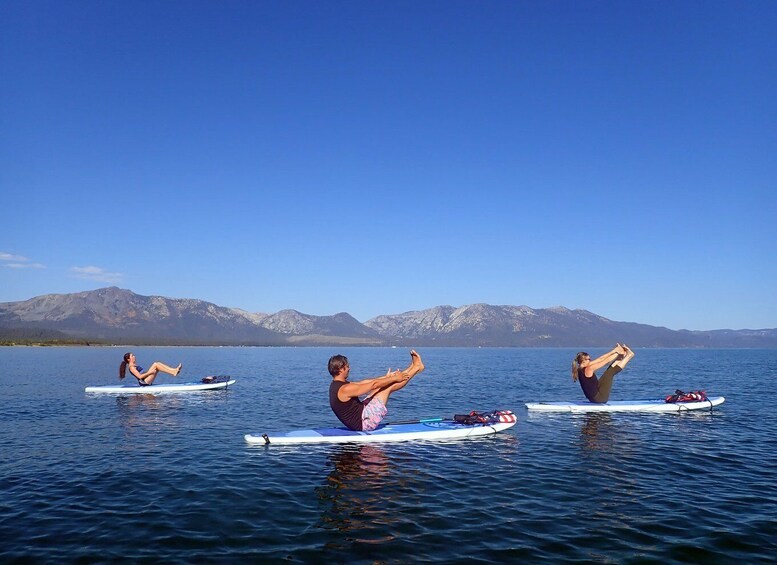 Picture 1 for Activity Lake Tahoe: Stand Up Paddle Yoga