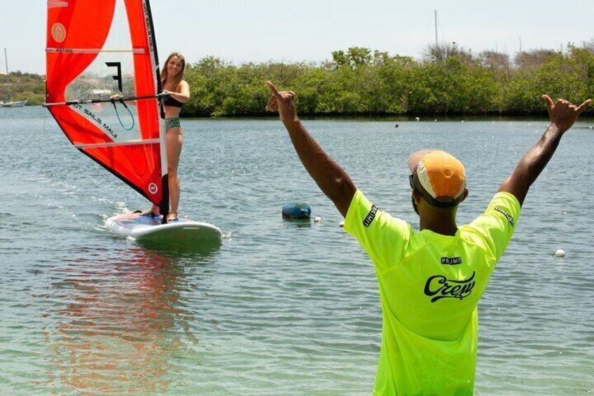 An enthusiastic instructor shares a moment of excitement with his student.