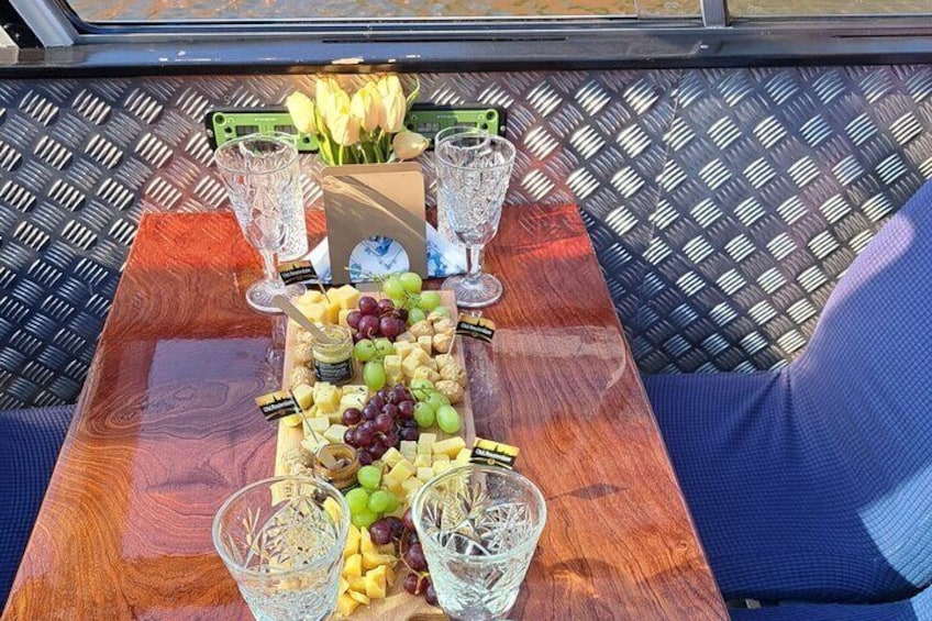 A Luxurious Cheese & Wine Canal Cruise through Historic Amsterdam