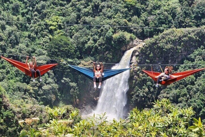 Paragliding and hammocks zipline over waterfalls private tour