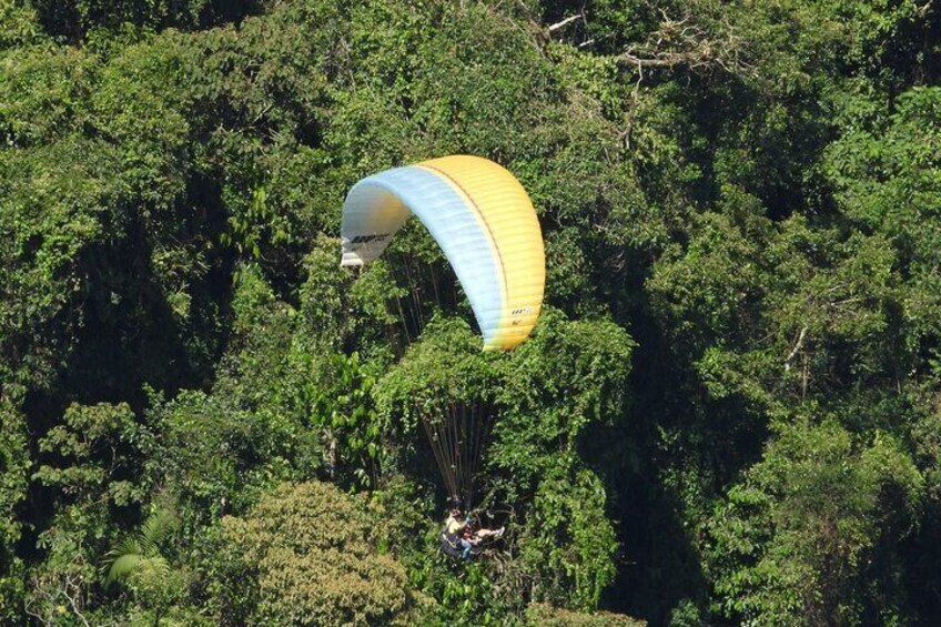 Paragliding and hammocks zipline over waterfalls private tour