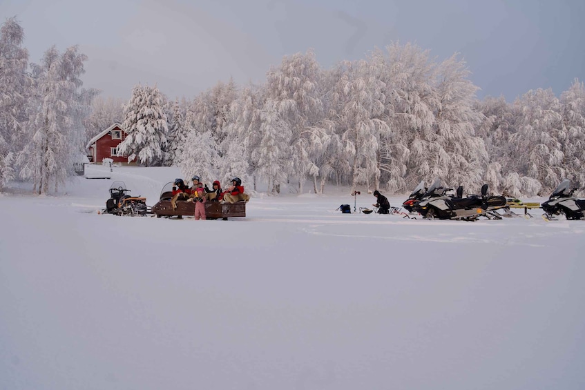 Picture 2 for Activity Rovaniemi: Ice Fishing and Snowmobile Tour with Snacks