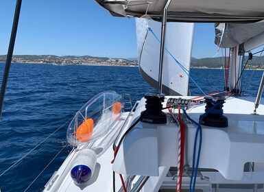 Departure from BRUSC sunset on sailing catamaran