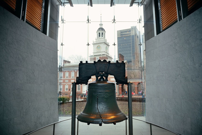 Liberty Bell in Philadelphia with Independence Hall in background