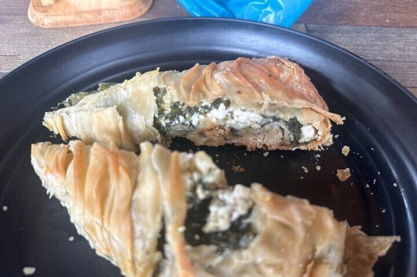 The Corner Spot's Spinach Pie looks like this before you eat it in 20 seconds.