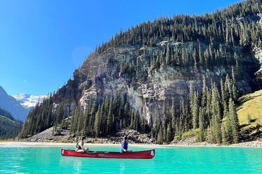 Couples paddling in Lake Louise.