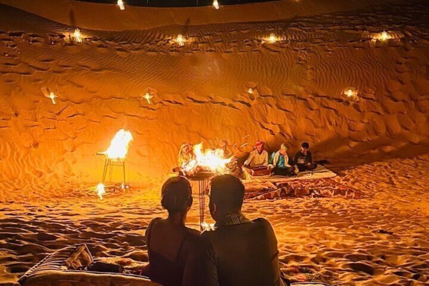 Romantic dinner in the dunes.