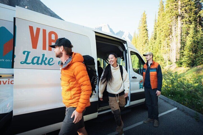 Group of friends arriving at Moraine Lake with the Via Via Shuttle