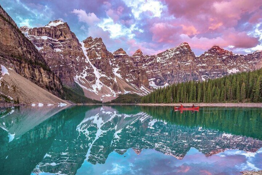 A colourful sunrise spectacle at Moraine Lake.