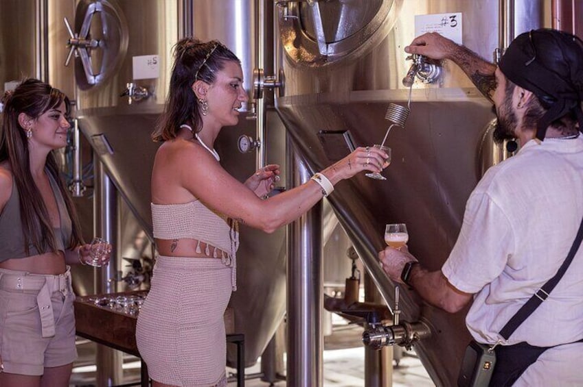 Prepare your senses by tasting beer directly from the fermentation tanks