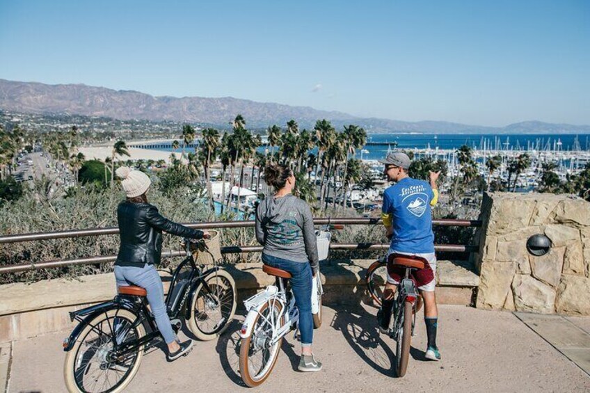 Bike tour enjoying the views from a lookout