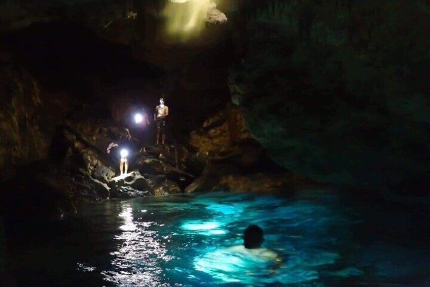 Delve deeper in the unlit sections of the cave pool