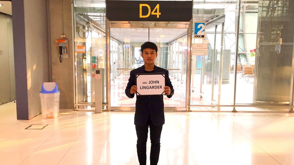 Driver waiting for a traveler at a Thailand airport