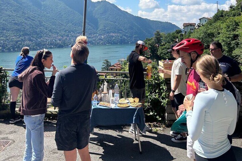 Snack break after the waterfall seeing offered by Lake Como Bicycle Tours