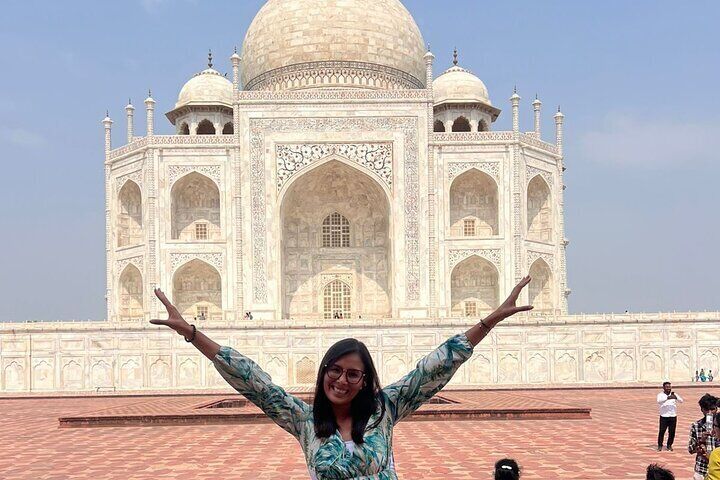Our happy, solo traveller at Taj Mahal