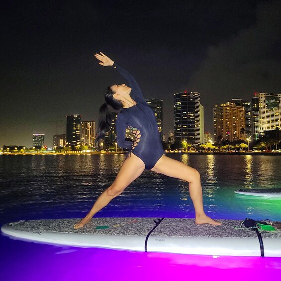 Picture 1 for Activity Honolulu: Night SUP Yoga Class