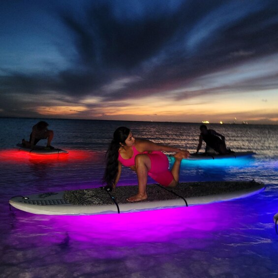 Picture 2 for Activity Honolulu: Night SUP Yoga Class