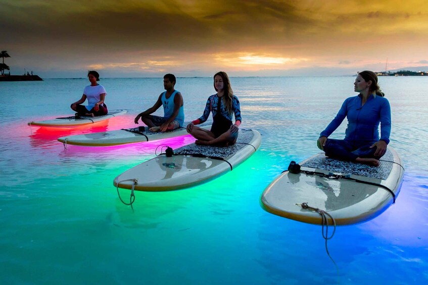 Honolulu: Night SUP Yoga Class