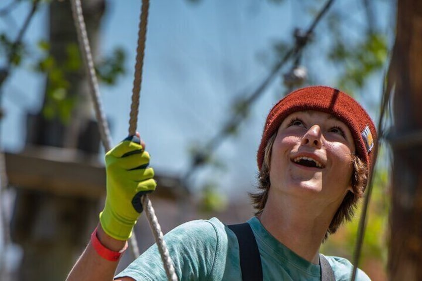 Choose your challenge: Stay low or go high on our 5 level ropes and zipline course. 